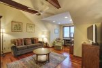 Cozy loft that doubles as work space or second living area.